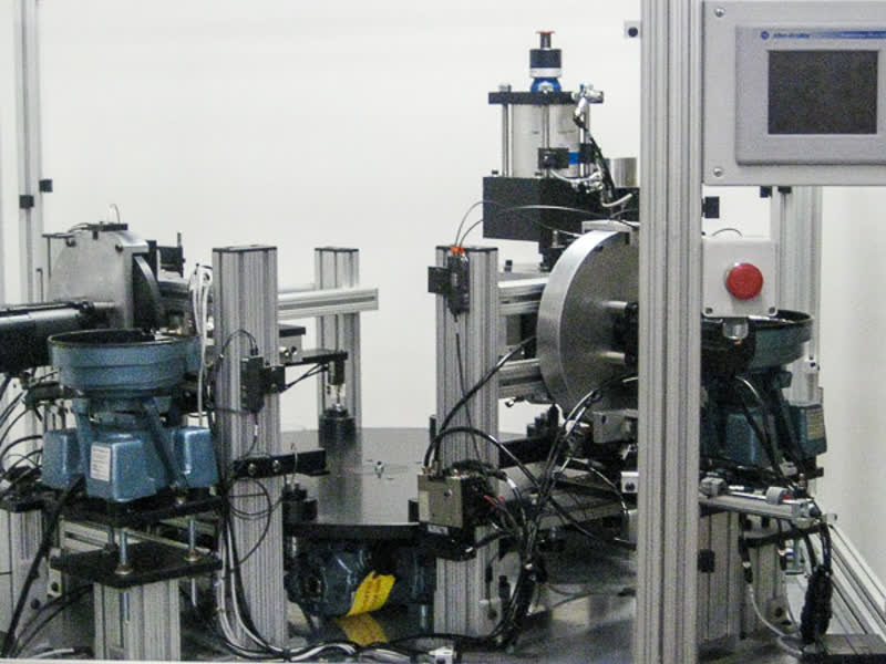 Rotary dial needle assembly system with vibratory feeder bowls