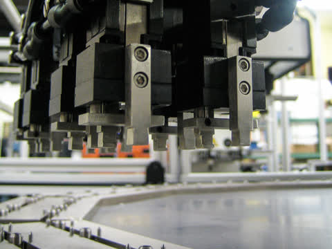 robot system built for complex production with integrated SCARA robot arm